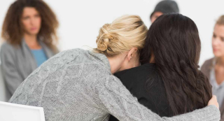 Women-group-sad-hug-abortion-regret